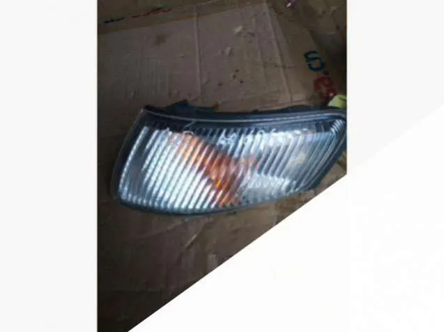 Поворотник левый Mazda 626 5 поколение (GF)