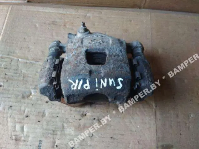 Суппорт передний правый Nissan Sunny B14