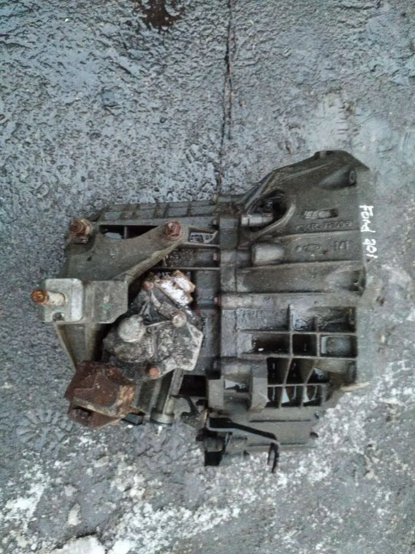 КПП (Коробка передач механическая) Ford Focus 1 поколение XS4R7F096AA