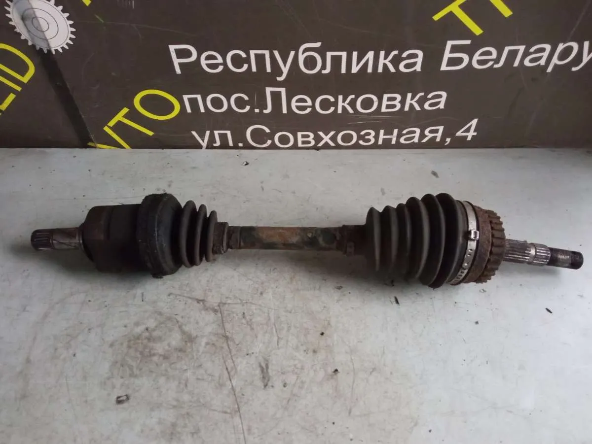 Полуось передняя левая (приводной вал, ШРУС) Opel Combo C