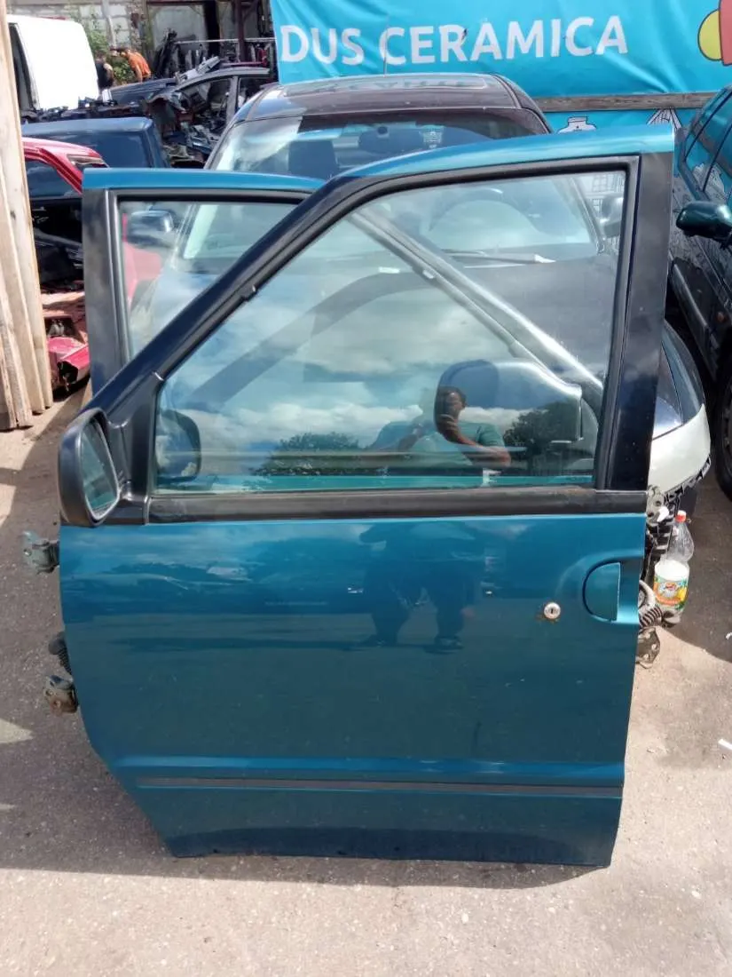 Дверь передняя левая Nissan Serena C23