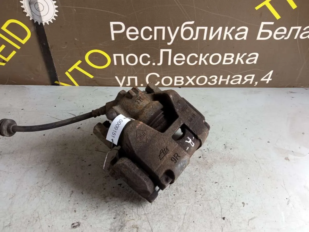 Суппорт тормозной передний правый Renault Scenic 3 поколение