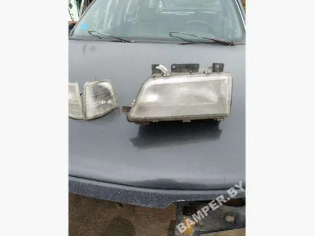 Фара левая Peugeot 405 1 поколение