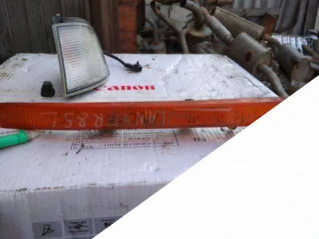 Поворотник левый Mitsubishi Lancer 2 поколение (A140)
