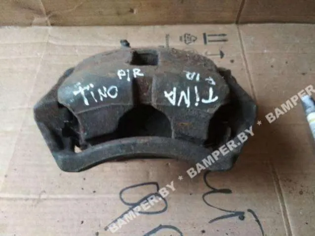 Суппорт передний правый Nissan Almera 2 поколение (N16)