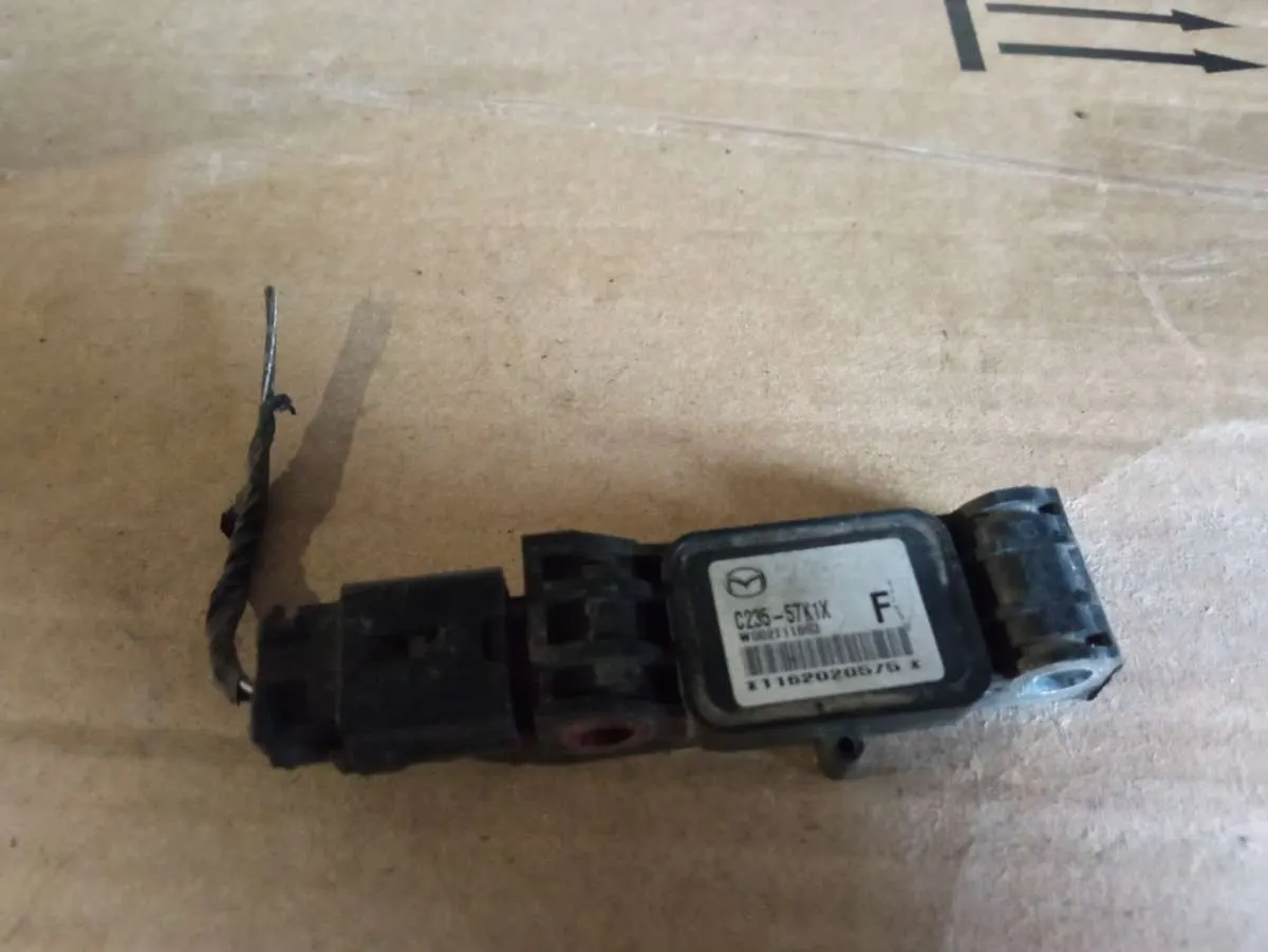 датчик удара Mazda 5 1 поколение C23557K1X