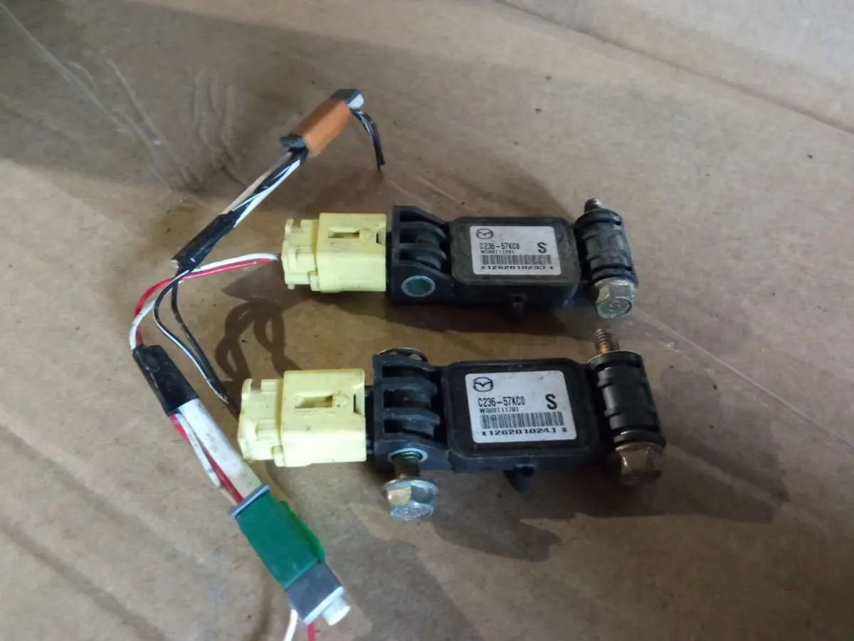 датчик удара Mazda 5 1 поколение C23657KC0