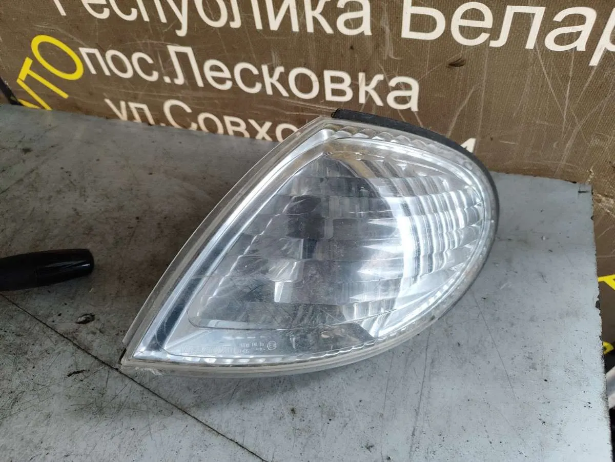 Поворотник левый Nissan Almera N16