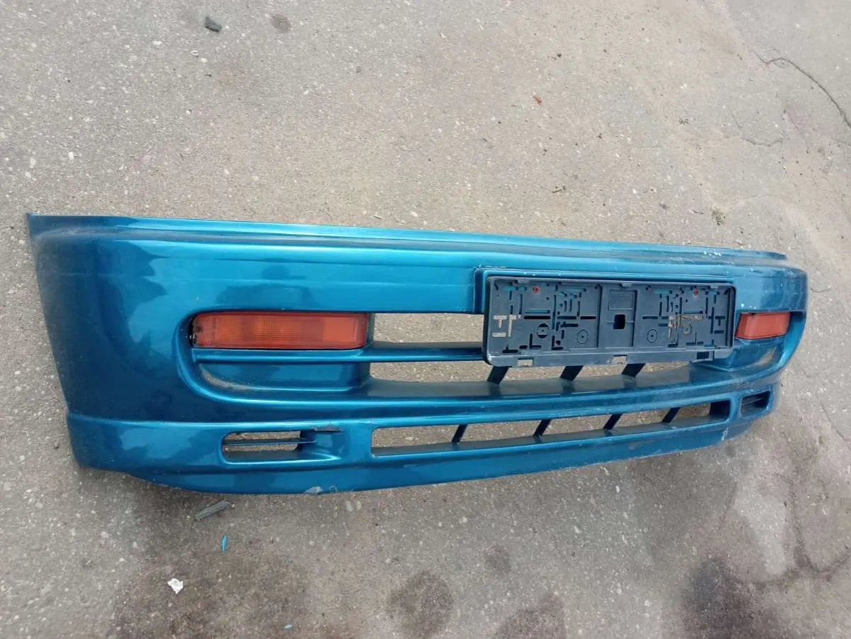 Заглушка (решетка) в бампер передний Nissan Serena C23
