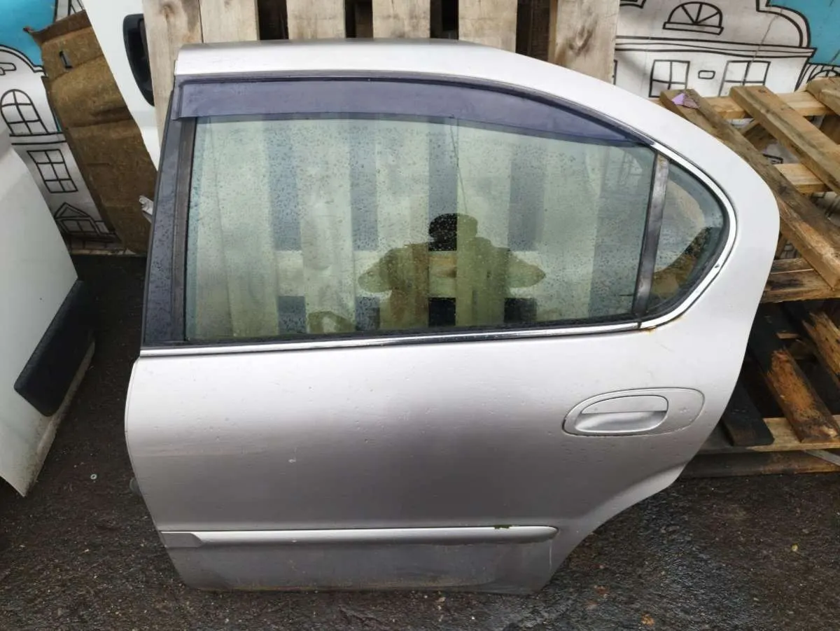 Стеклоподъемник электрический задний левый Nissan Maxima 5 поколение