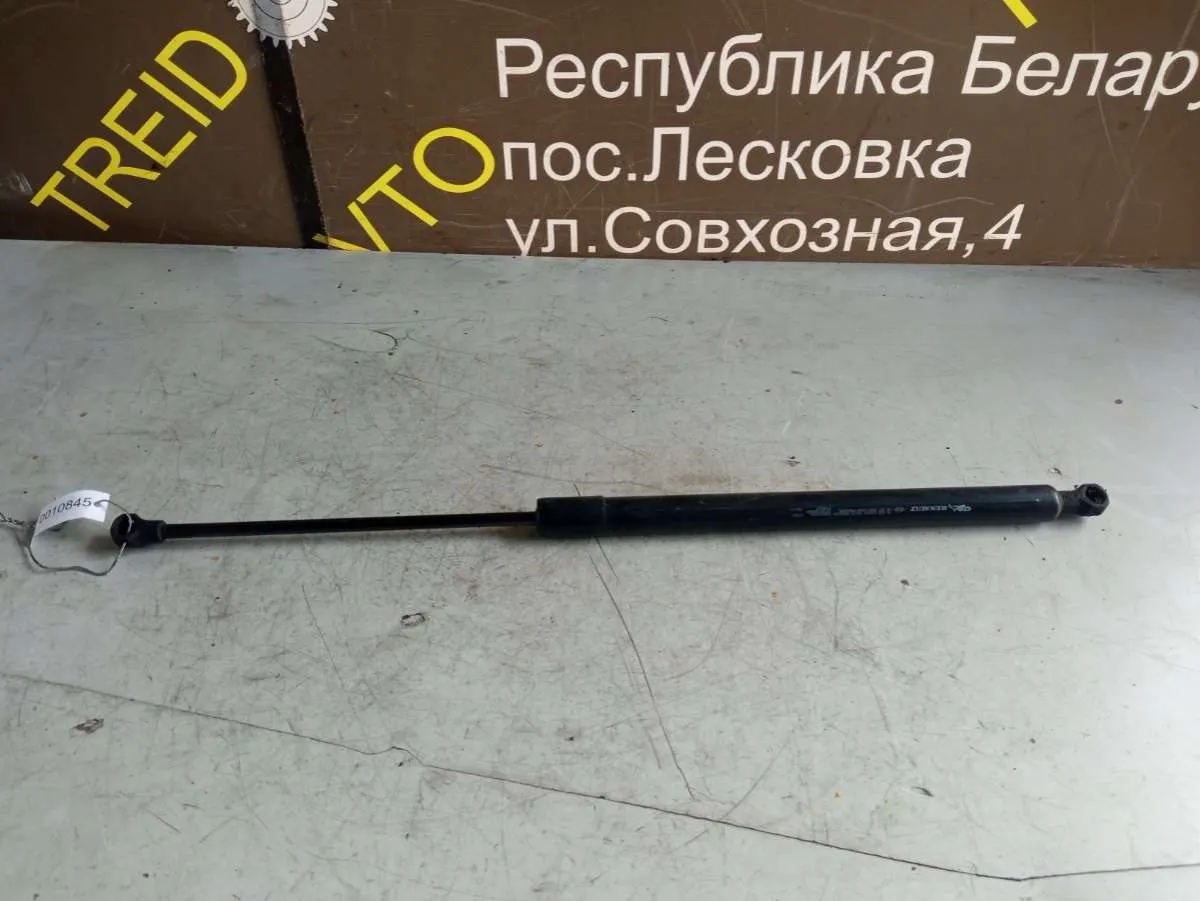 Амортизатор бокового ящика Renault Scenic 3 поколение