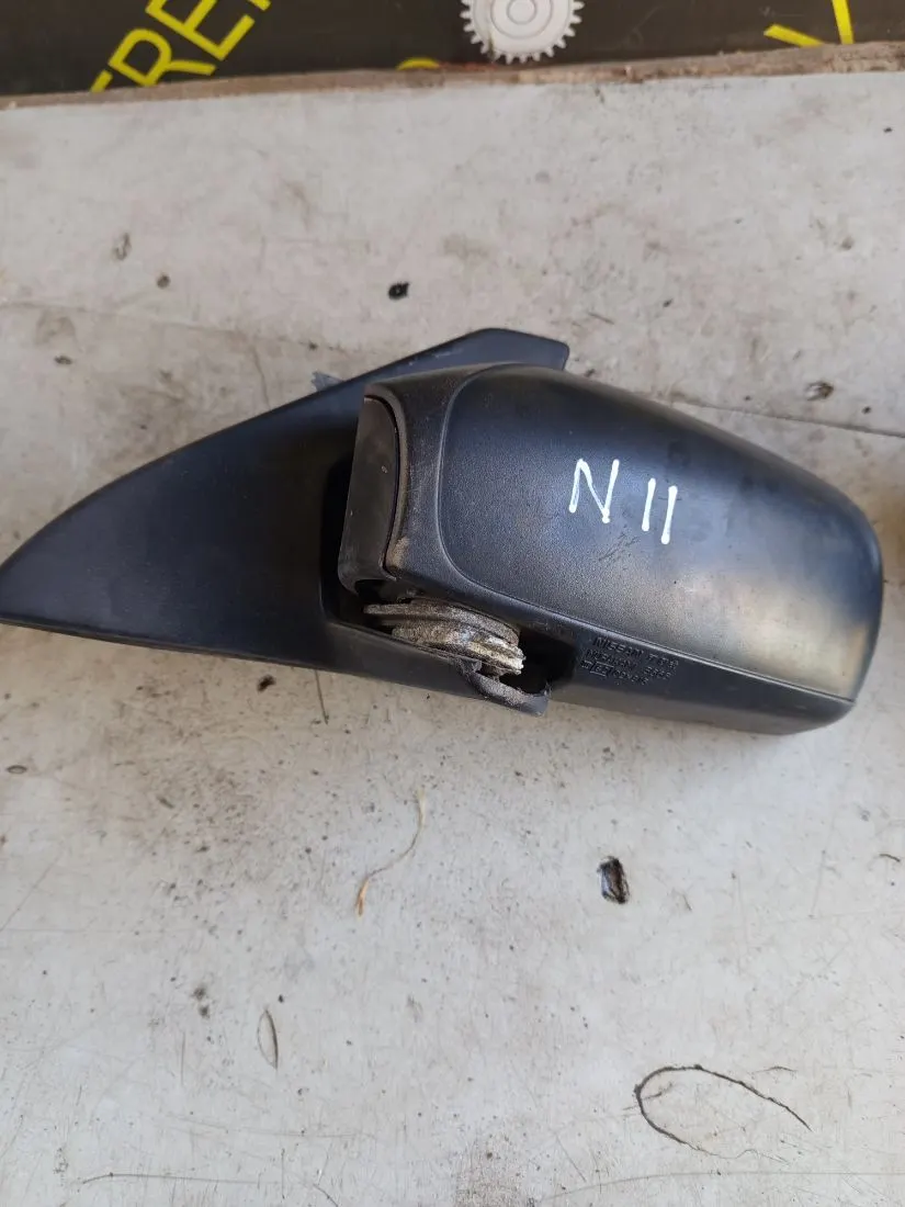 Зеркало левое Nissan Sunny Y10