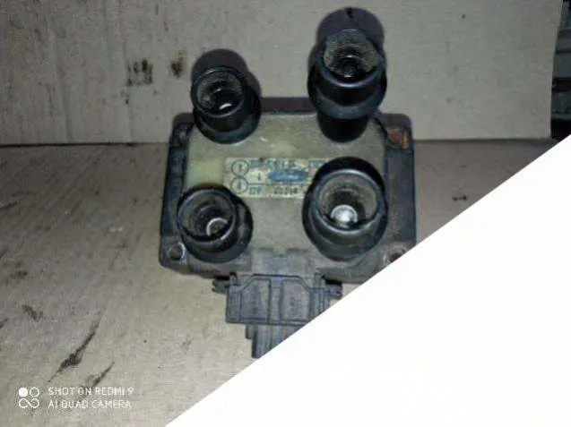 Катушка зажигания с коммутатором Ford Escort (North America) 2 поколение 928F12024BE